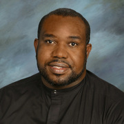 Father Dumarsais Pierre-Louis, Pastor
